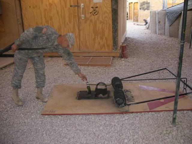 [Image: soldier_w_giant_mousetrap.jpg]